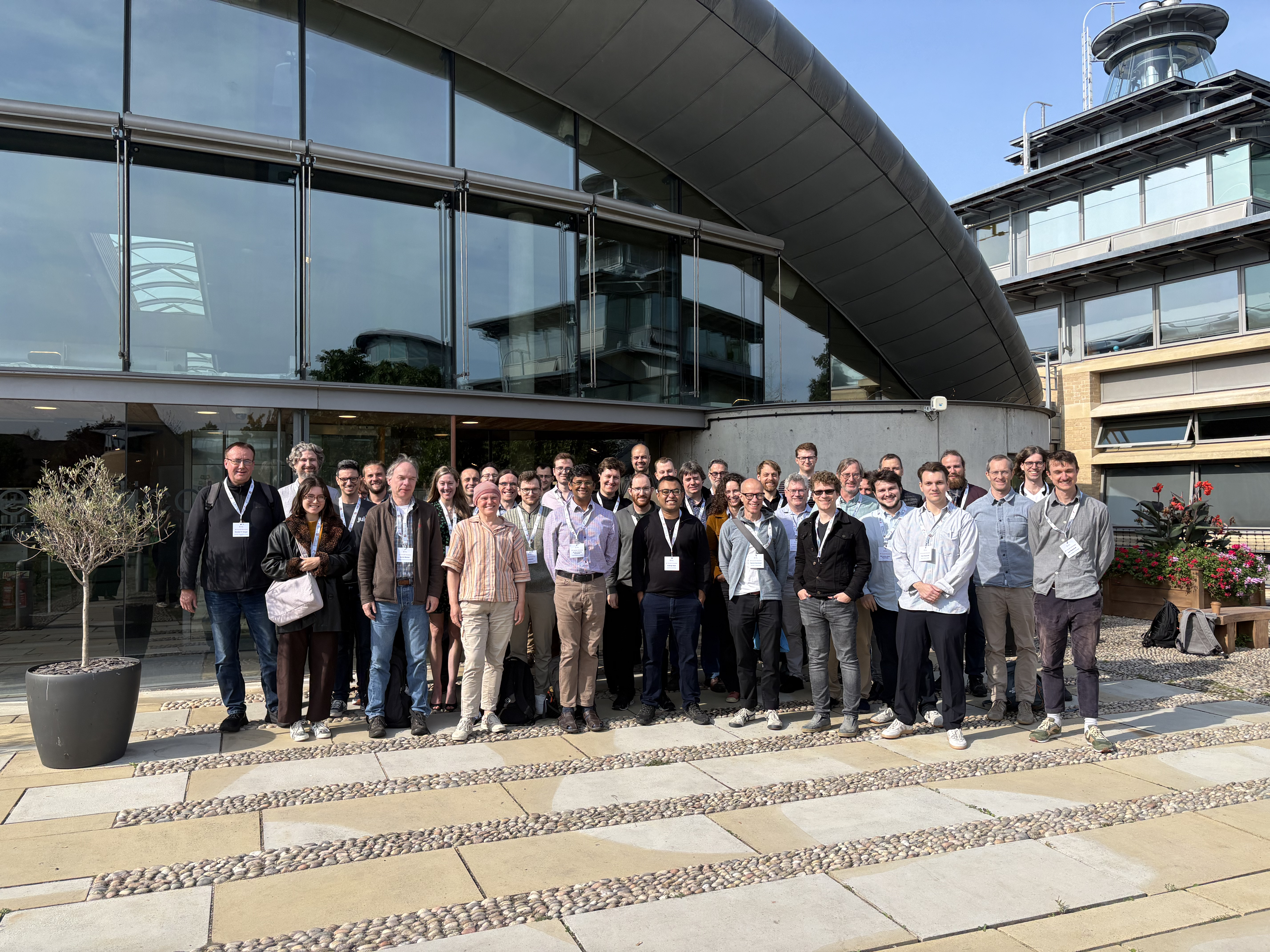 Workshop photo outside the Centre for Mathematical Sciences, University of Cambridge